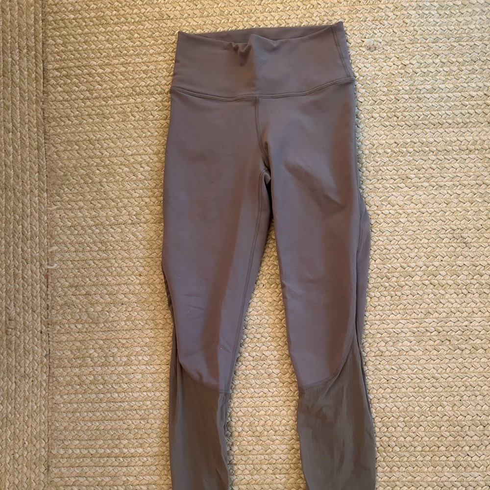 Gray leggings with mesh on the bottom